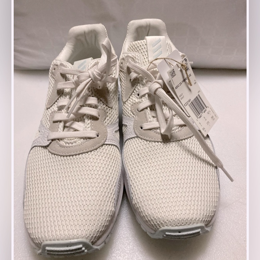 New men’s Adidas ZX prime blue golf sneakers. Size 8.5 cream color.